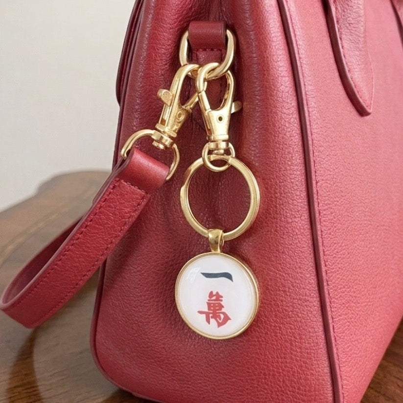 mahjong crack bag charm gold